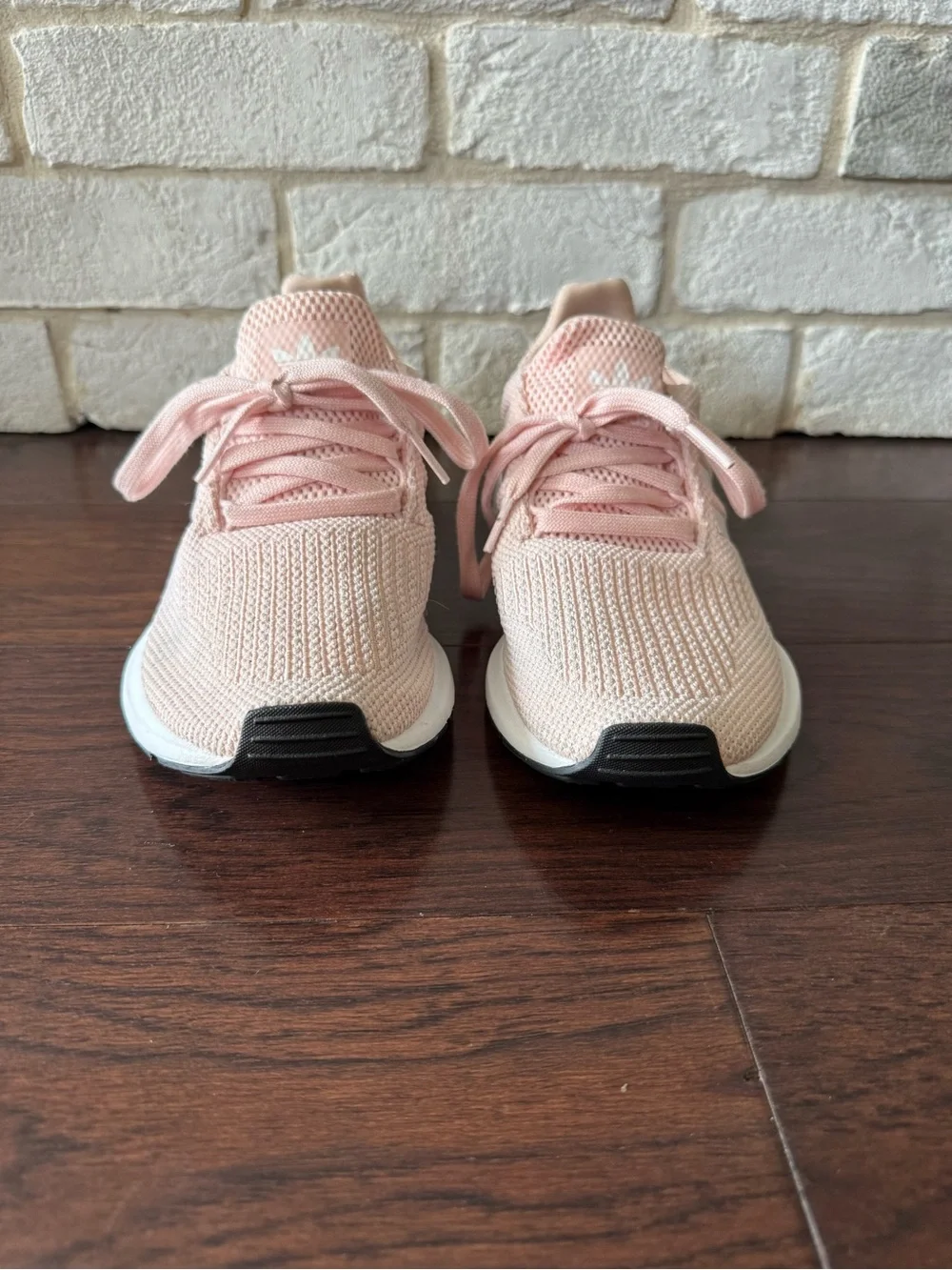 Adidas Swift Run Sneaker in Light Pink